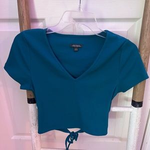 blue v neck crop top with tie in the back